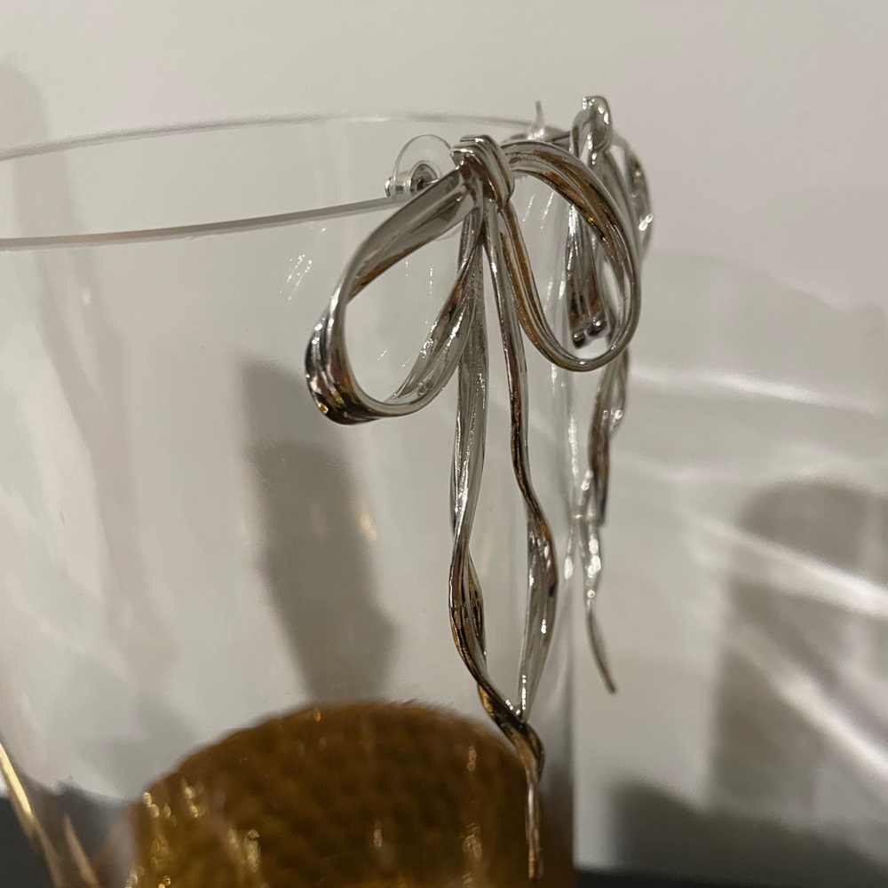 Anthro Silver Bow Earring - Picture 8 of 9